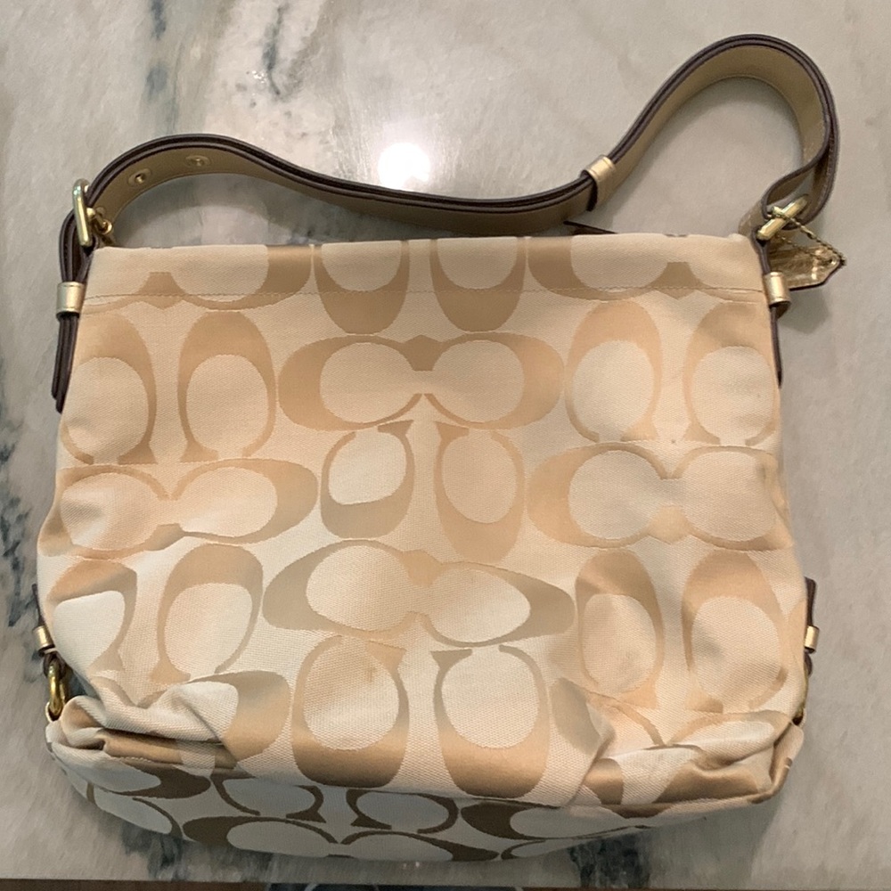 COACH 15067 bag  - Signature duffel bag - gold hardware and strap.